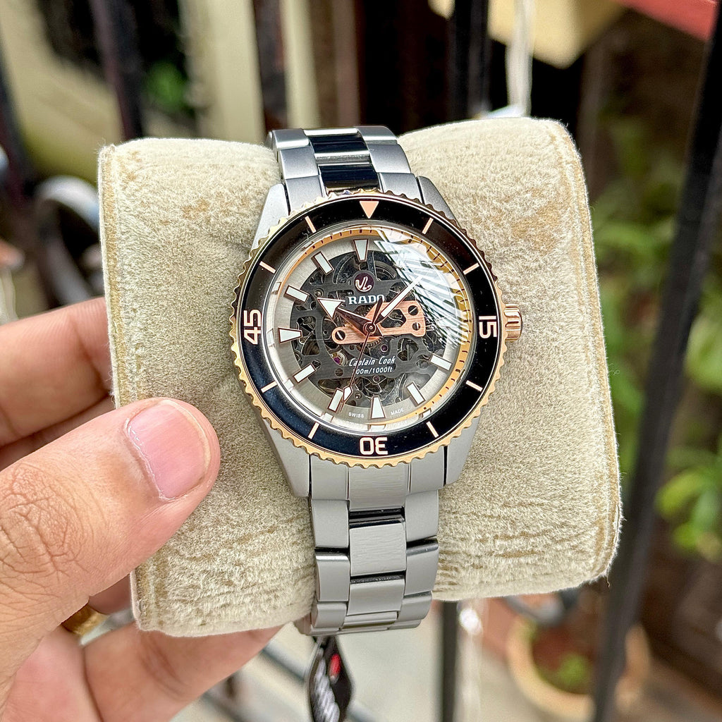 Rado Captain Cook Automatic Skeleton Rose Gold Dial & Two-Tone Stainless Steel
