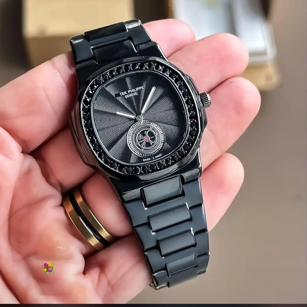 Patek Philippe Nautilus Black Diamond Bezel Open Dial